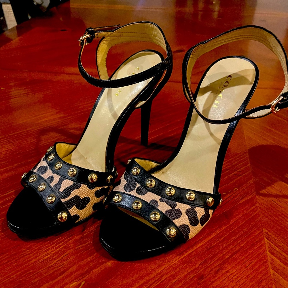 Leopard print & black Coach heels. Gold accents.